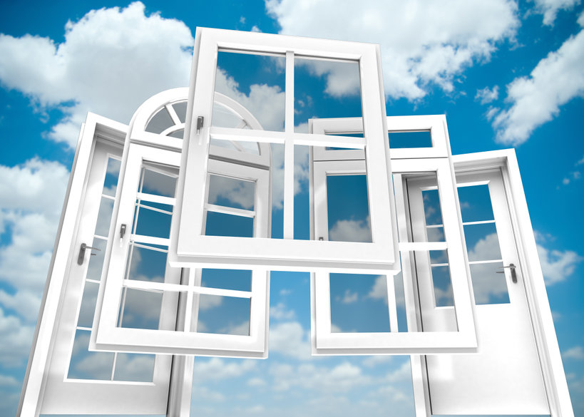 Selection of doors and windows with a blue sky on the background